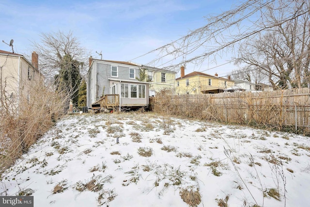 view of snow covered house