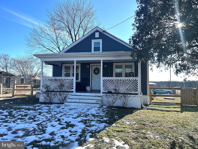 bungalow-style home with a porch