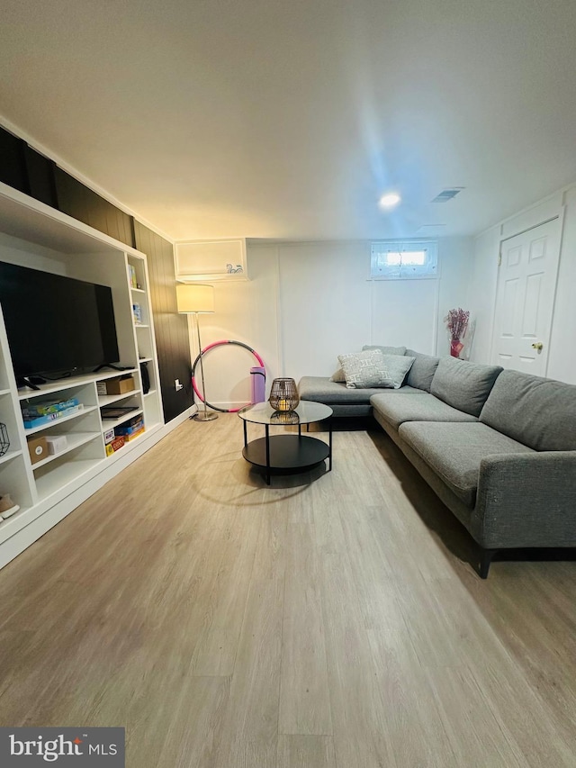 living room with hardwood / wood-style flooring