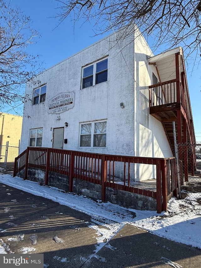 exterior space featuring a balcony