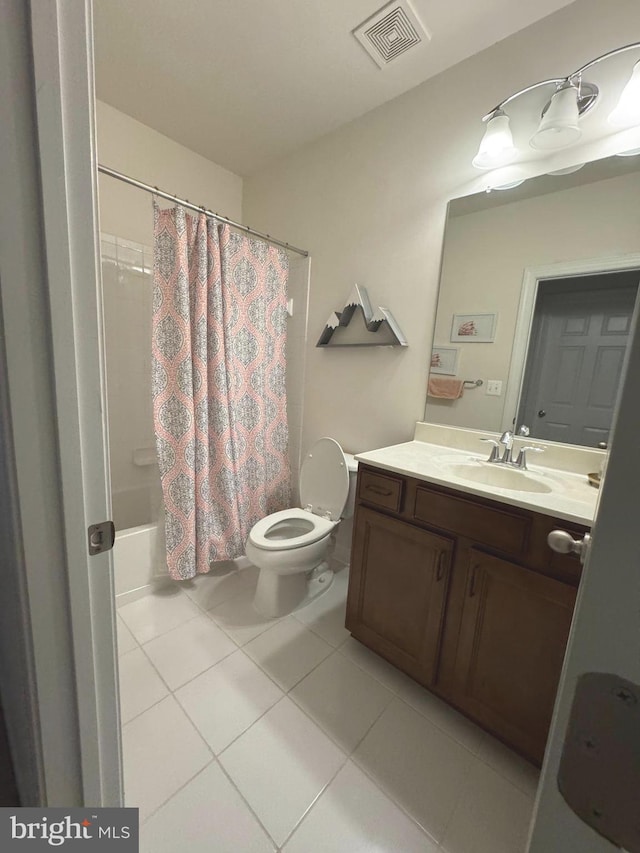 full bathroom with tile patterned flooring, visible vents, toilet, shower / bath combination with curtain, and vanity