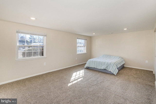 unfurnished bedroom with carpet