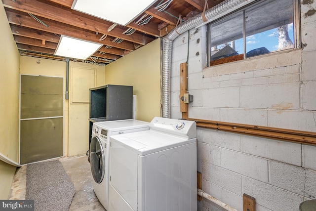 washroom with washing machine and dryer