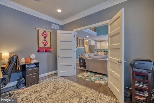 office area with ornamental molding and dark hardwood / wood-style flooring