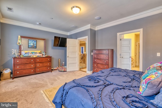 carpeted bedroom featuring connected bathroom and crown molding