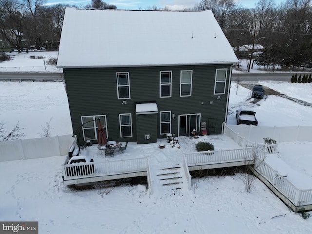 view of snow covered property