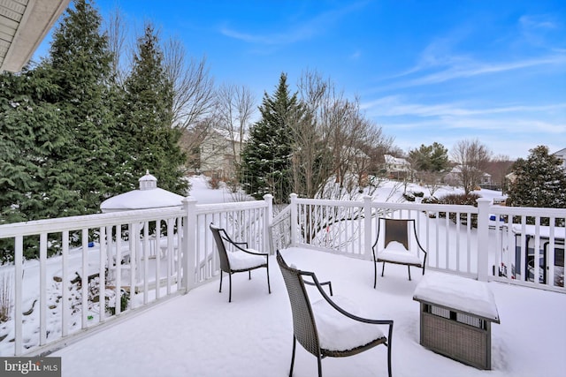 view of snow covered patio