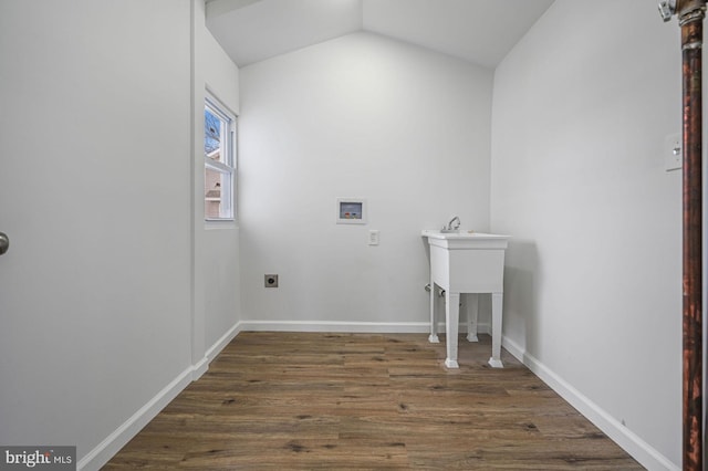 clothes washing area featuring washer hookup, dark hardwood / wood-style floors, and electric dryer hookup