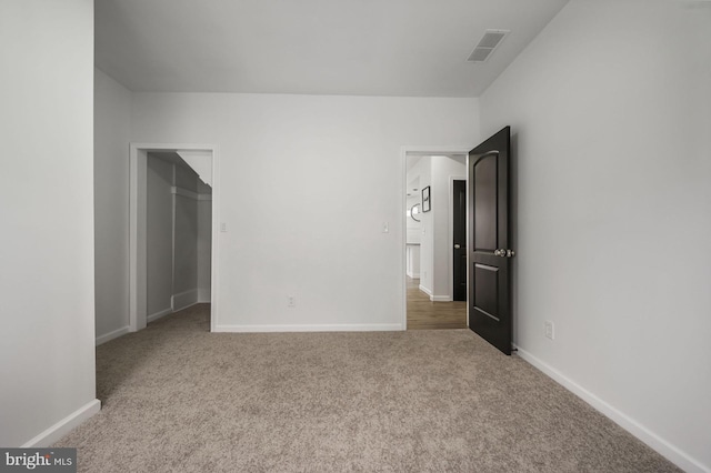 unfurnished bedroom with carpet