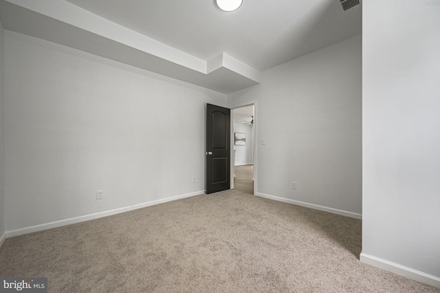 unfurnished bedroom featuring light colored carpet