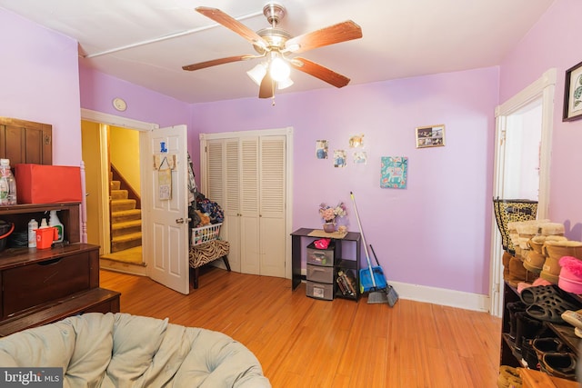 interior space featuring ceiling fan and light wood-type flooring