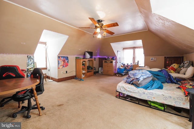 bedroom featuring carpet floors, ceiling fan, and vaulted ceiling