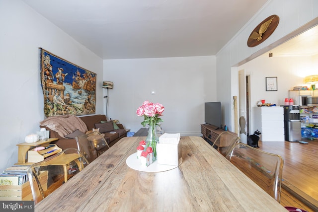 dining space featuring hardwood / wood-style floors