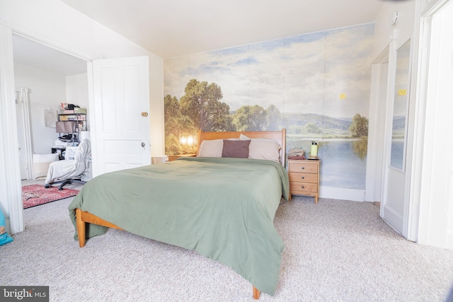 bedroom featuring light colored carpet