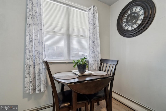 dining room with baseboard heating