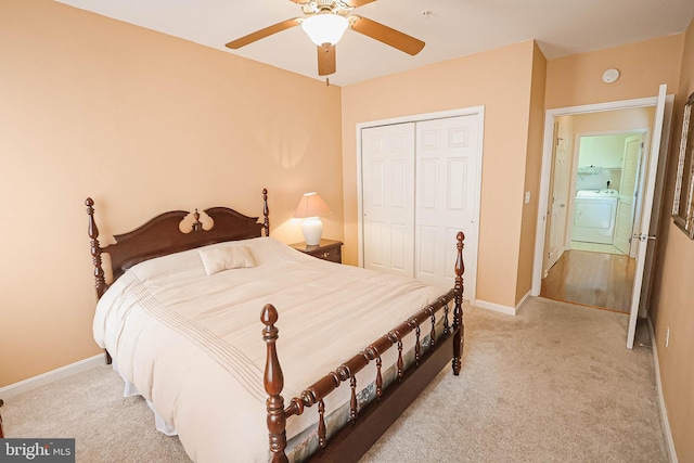 carpeted bedroom featuring washer / dryer, a closet, and ceiling fan