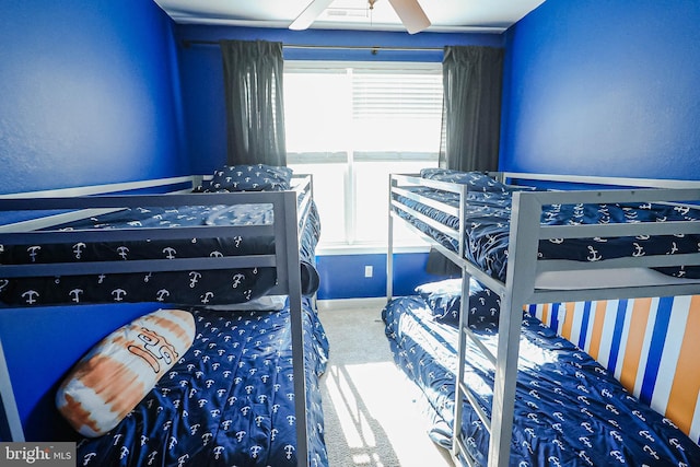 bedroom featuring ceiling fan and carpet floors