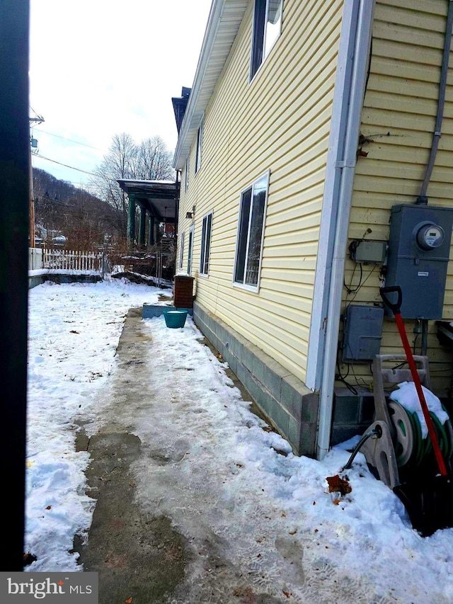 view of snow covered property