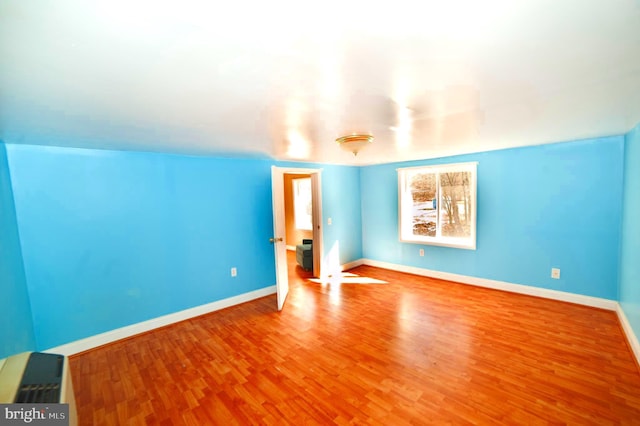 interior space with hardwood / wood-style floors