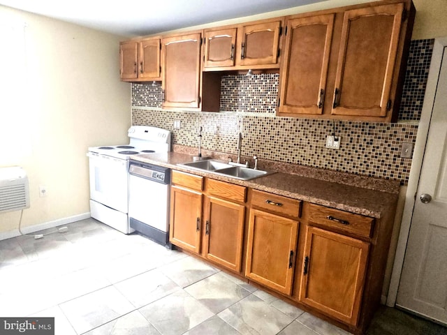 kitchen featuring dishwasher, sink, backsplash, and white range with electric stovetop