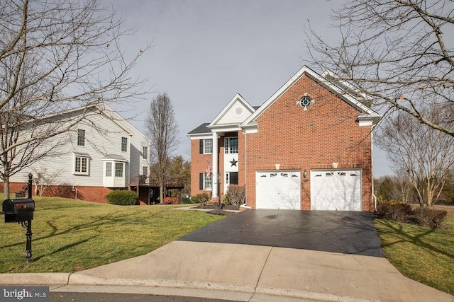 front facade with a garage and a front yard