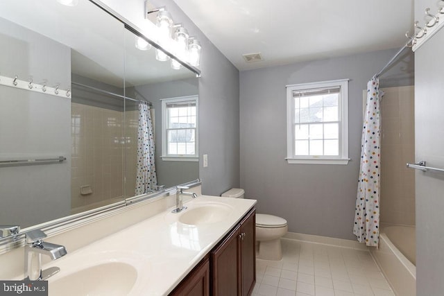 full bathroom featuring tile patterned floors, toilet, shower / tub combo, and vanity