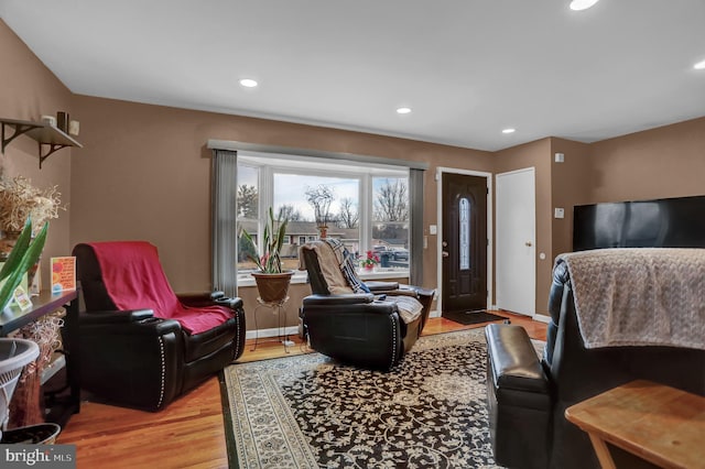 bedroom with light hardwood / wood-style floors