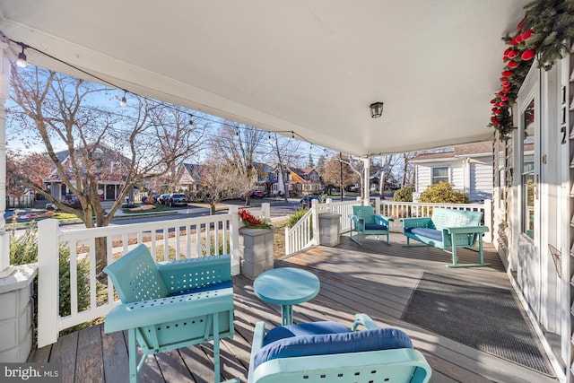 deck with covered porch