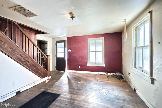 foyer entrance featuring dark hardwood / wood-style flooring