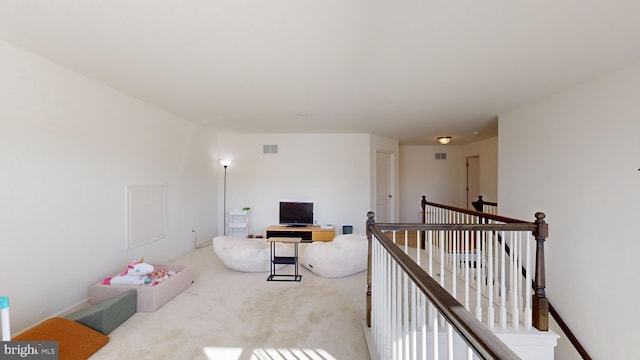 office space with light colored carpet