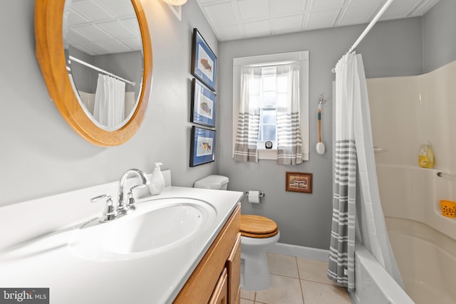 full bathroom with tile patterned flooring, vanity, toilet, and shower / bathtub combination with curtain