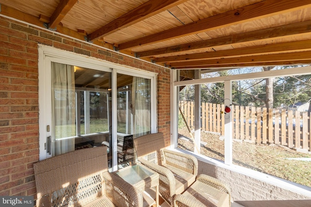 sunroom / solarium with beamed ceiling and wooden ceiling