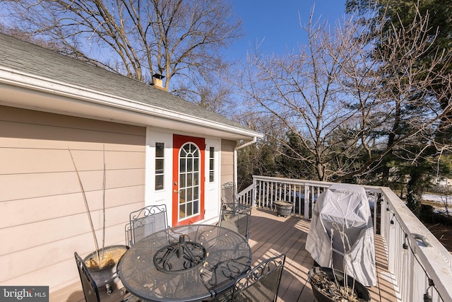 wooden deck featuring grilling area