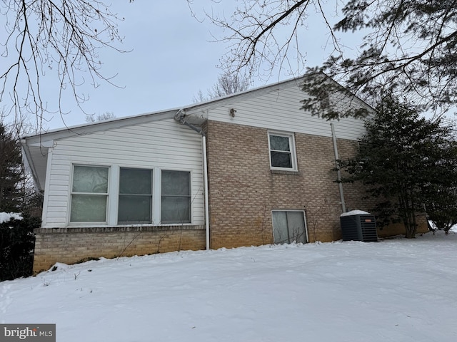 view of snow covered property