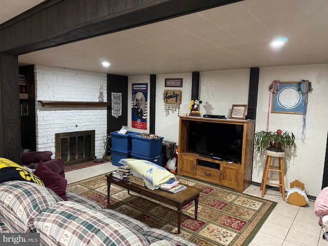 tiled living room featuring a fireplace