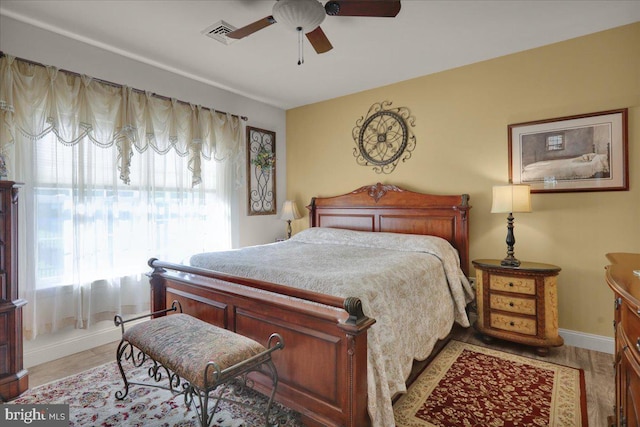 bedroom featuring ceiling fan and light wood-type flooring