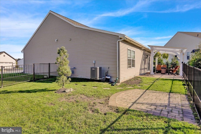 view of property exterior with central AC, a yard, a pergola, and a patio area