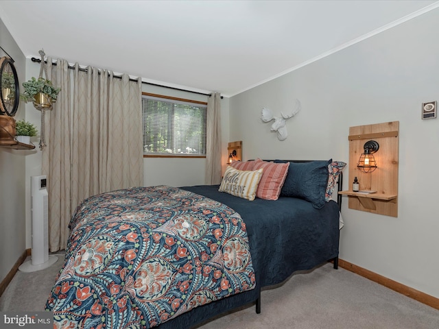 bedroom featuring crown molding and light carpet