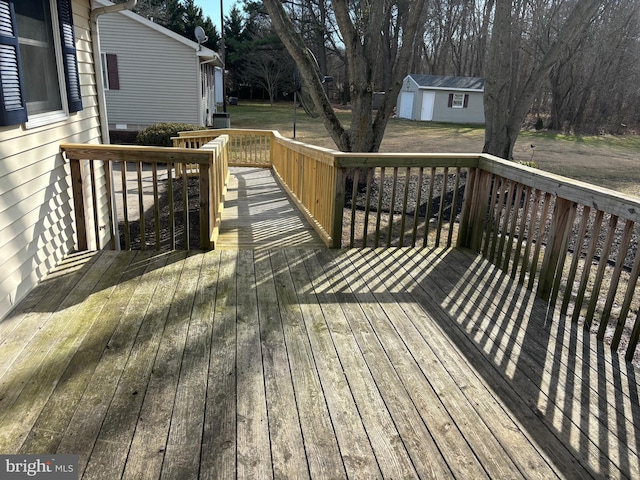 deck with an outdoor structure