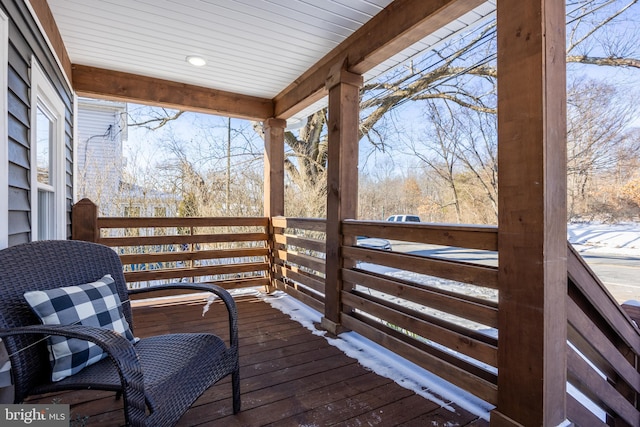 view of snow covered deck