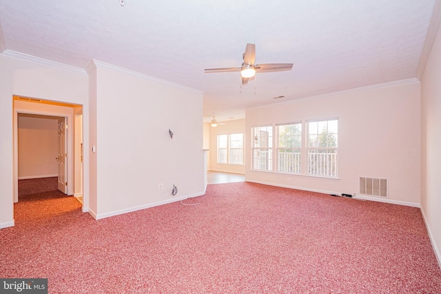 empty room with crown molding, carpet flooring, and ceiling fan