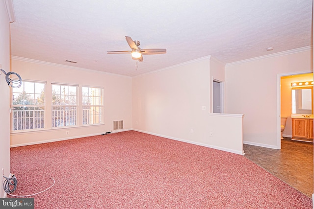 unfurnished room with ceiling fan, crown molding, and a textured ceiling