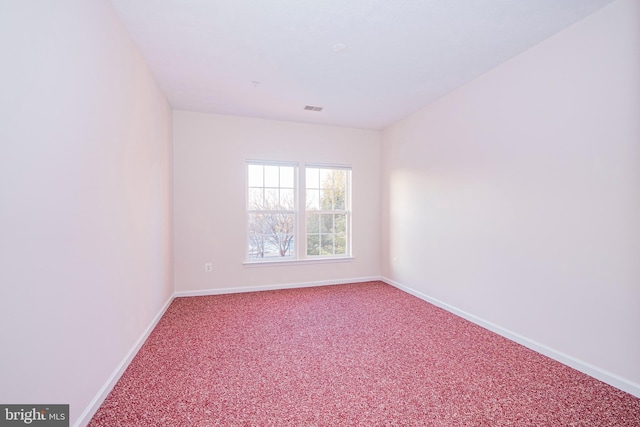 unfurnished room with carpet