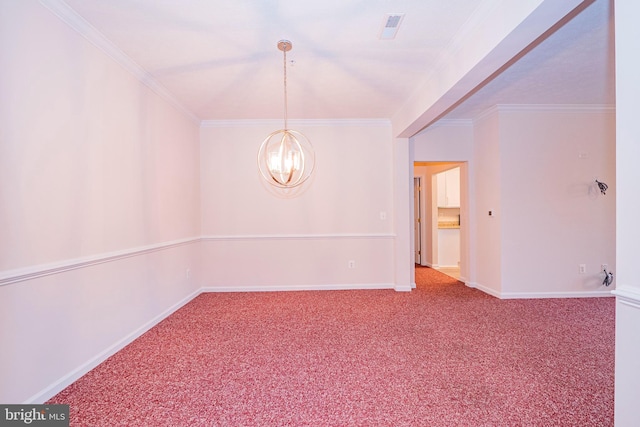 empty room featuring carpet, crown molding, and a chandelier