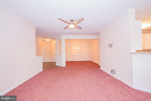 unfurnished room with ceiling fan, a textured ceiling, crown molding, and carpet flooring