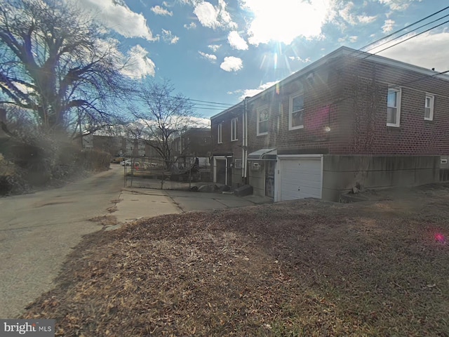 view of home's exterior with a garage