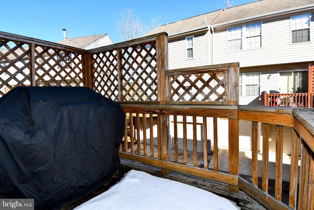 wooden deck with area for grilling