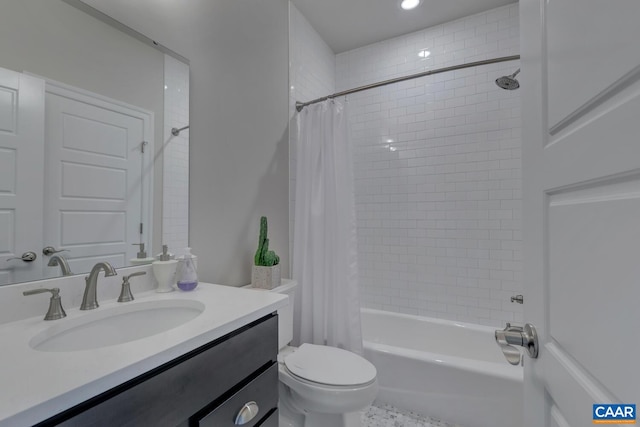 full bathroom with shower / bath combo with shower curtain, toilet, and vanity