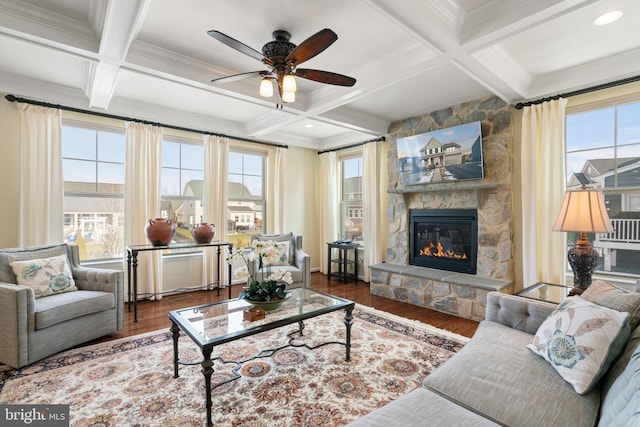 living room with coffered ceiling, dark wood-type flooring, and beamed ceiling