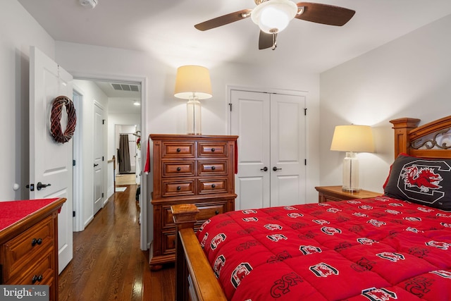 bedroom with ceiling fan, dark hardwood / wood-style flooring, and a closet